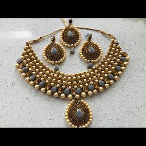 Tikka with beautiful necklace and earrings